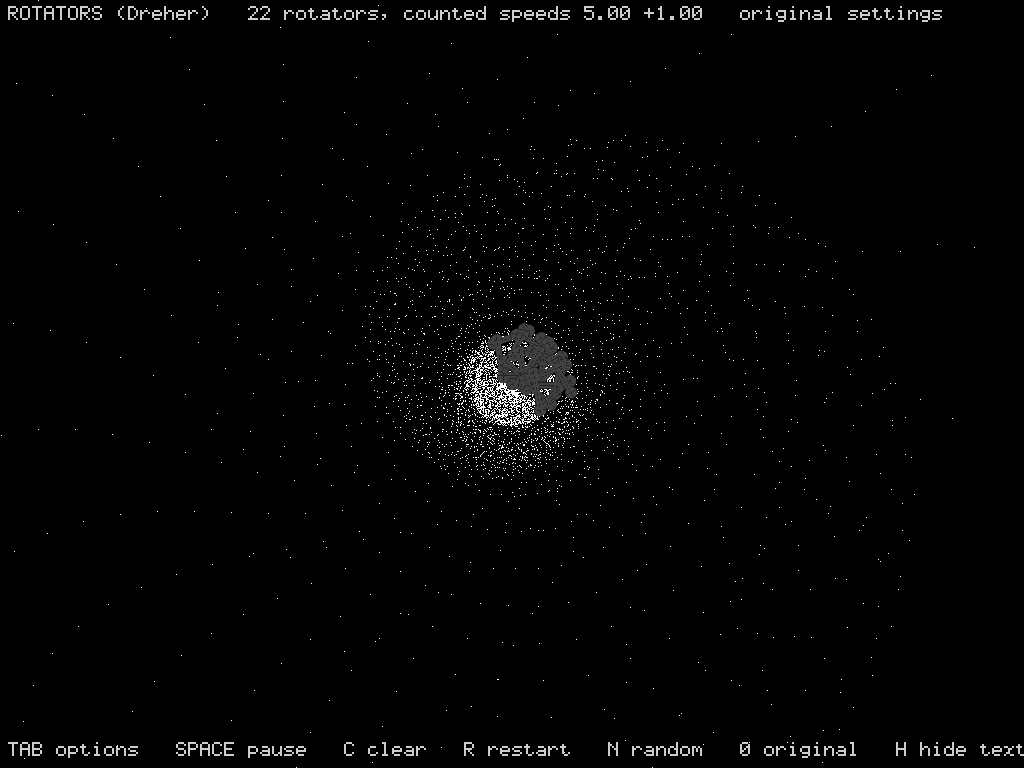 Rotators: a cloud of white dots around a cluster of spinning grey keys in the middle of a black screen, with option keys listed at the bottom